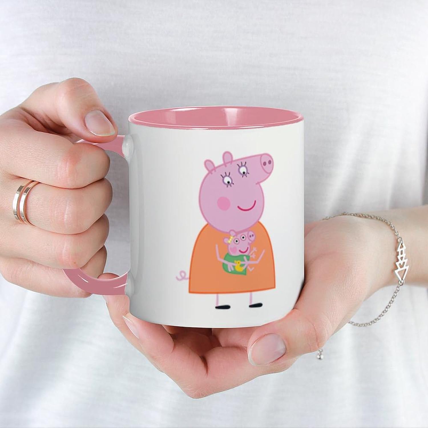 CafePress Peppa Pig: Holding Baby 11 oz (325 ml) Ceramic Coffee Mug
