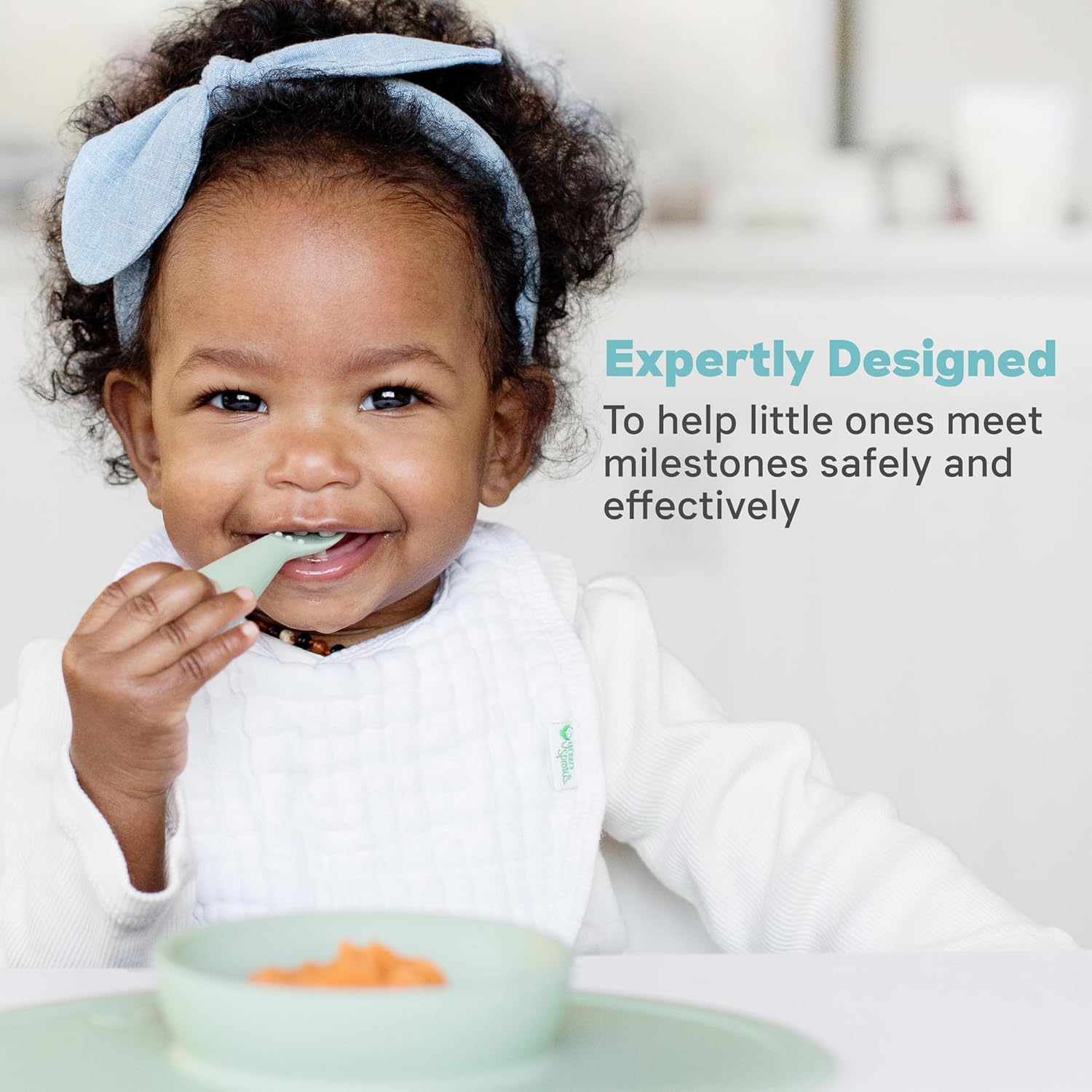ezpz Tiny Spoon + Tiny Placemat - baby essentials spoon and mat