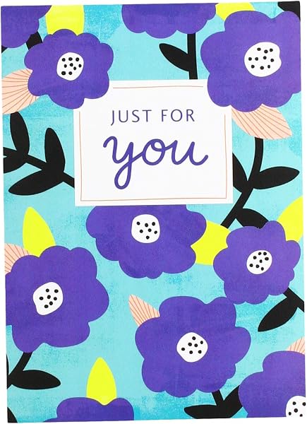 Close-up of the Amazon.co.uk Gift Card affixed inside a decorative greeting card, ready for personalisation.