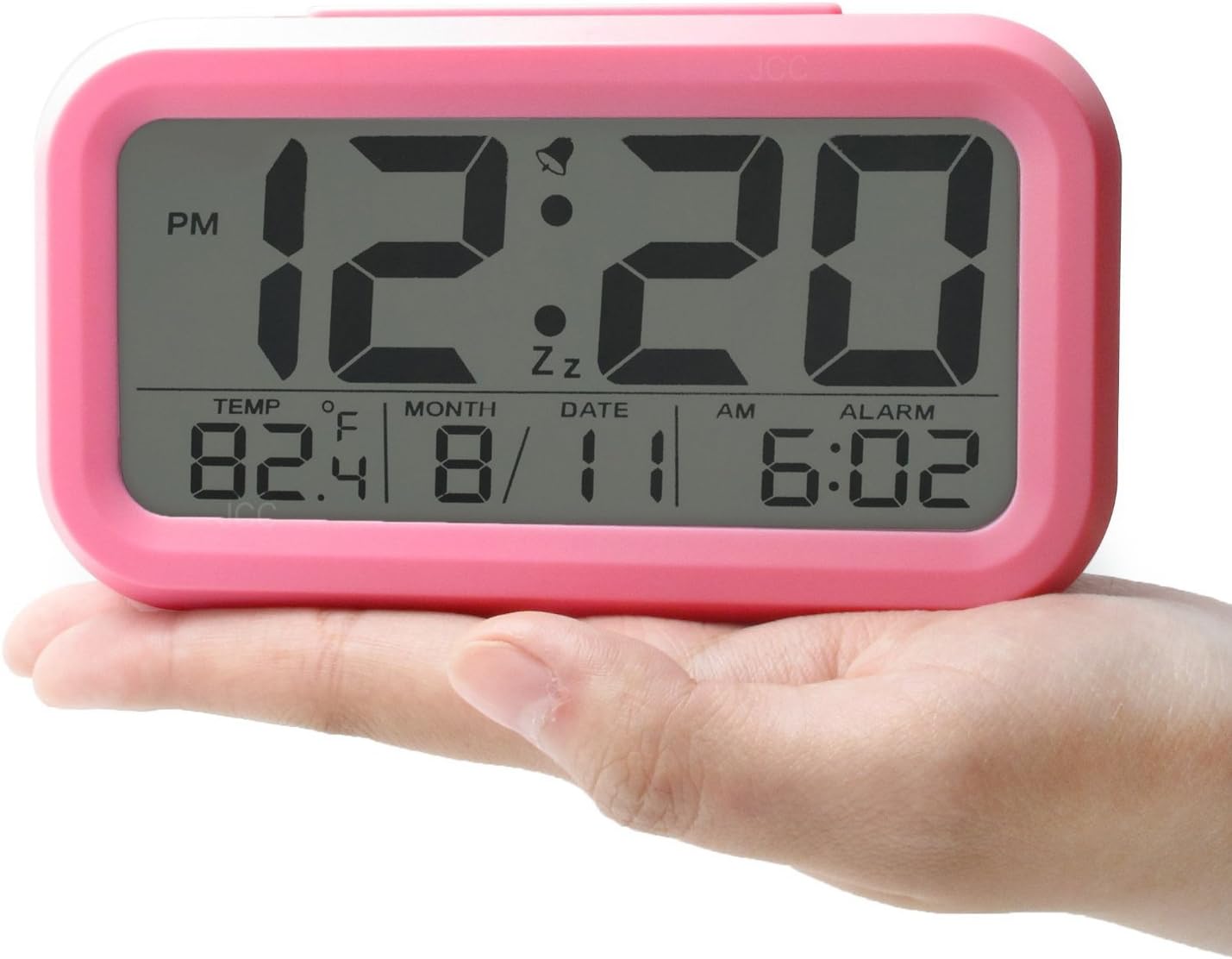 JCC Smart Light Sensor Automaticm Soft Light Large Numbers LCD Digital Snooze Alarm Clock with Ascending Wake Up Alarm, Snooze, Date and Temperature Display (°C/°F), Battery Operated (Pink)