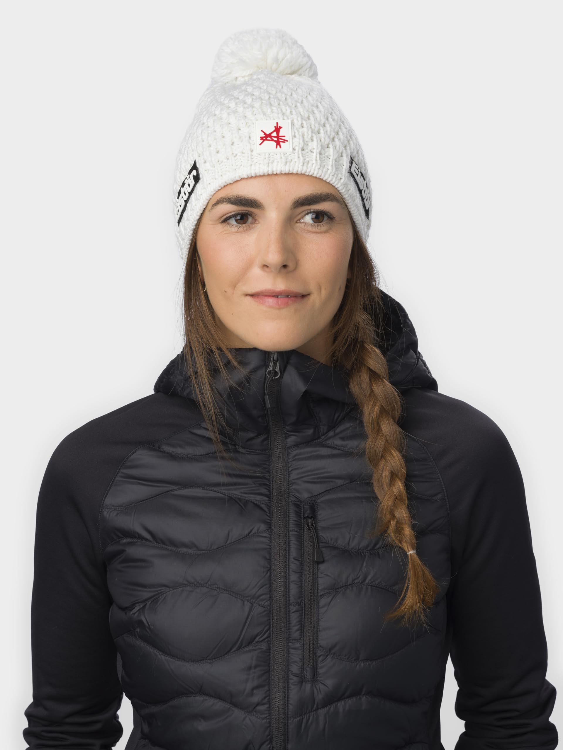 Eisbär Czapka damska Trail Pompon Ski Austria – czapka zimowa z merynosów dla kobiet – z polarem chroni przed zimnem i wiatrem – oddychająca elastyczna czapka z dzianiny z Austrii
