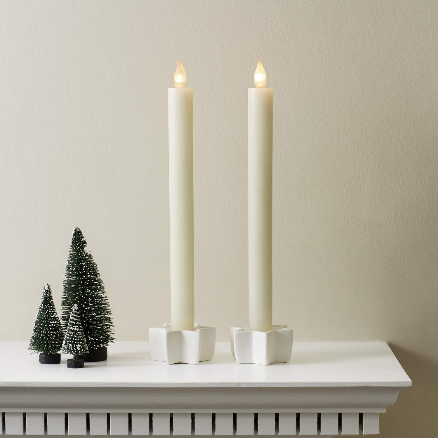 Lights4fun Set of 4 Battery Operated Ivory Real Wax LED Push-Top Taper Candles