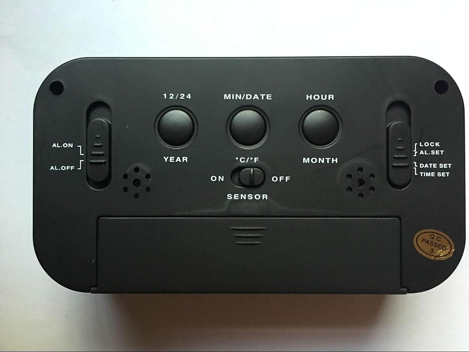 Rear view of the Peakeep S8 Digital Alarm Clock showing control buttons and switches.