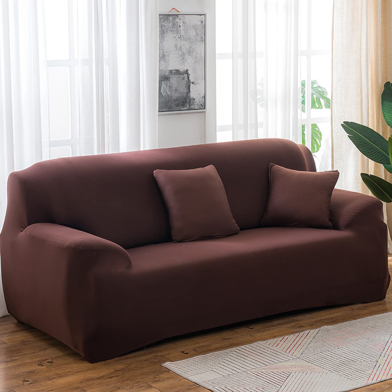 Housse de canapé extensible marron pour rénover un canapé 4 places usé