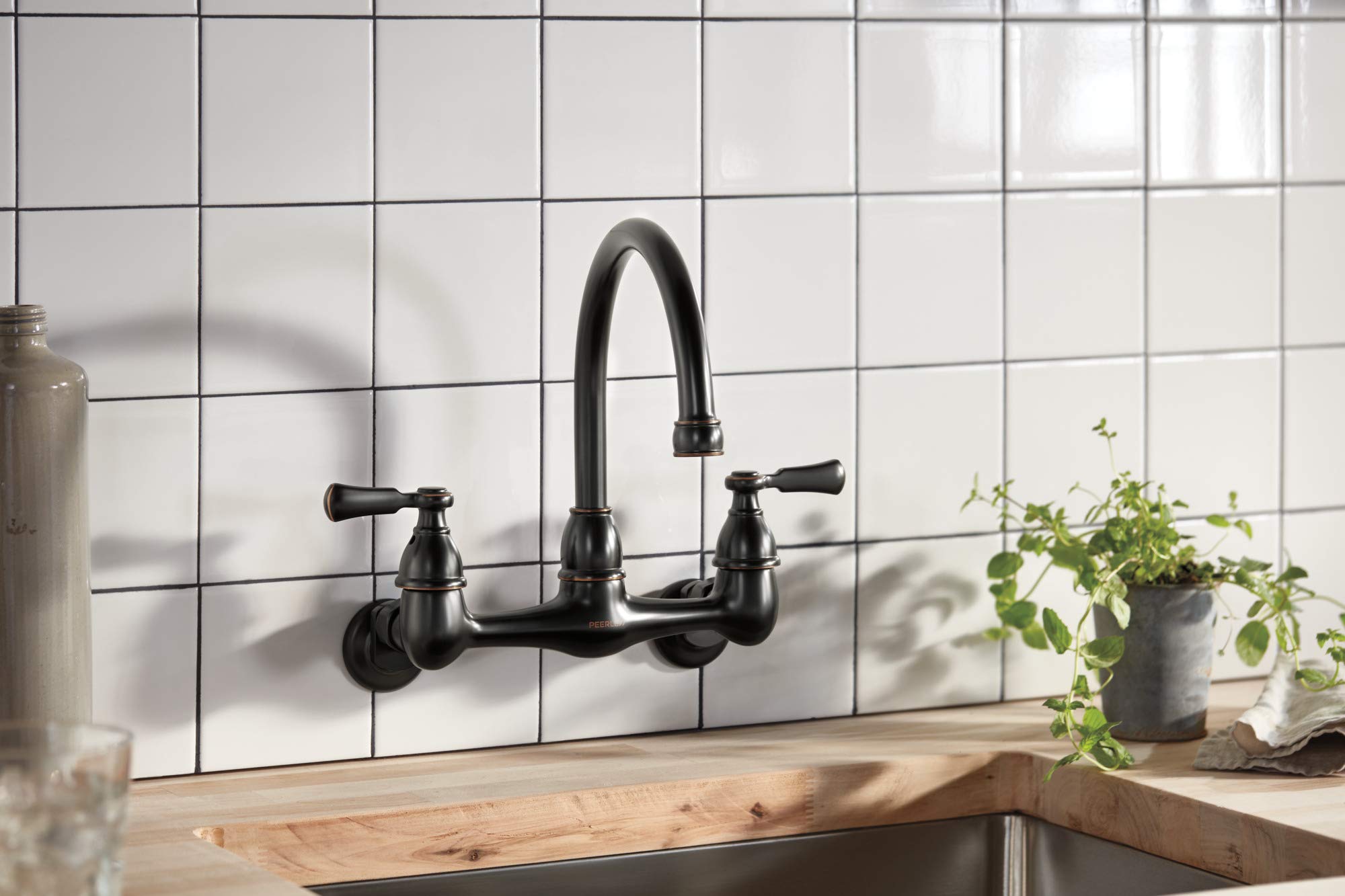 Peerless P2765LF-OB Elmhurst - Grifo de cocina de dos manijas, montaje en pared, bronce aceitado