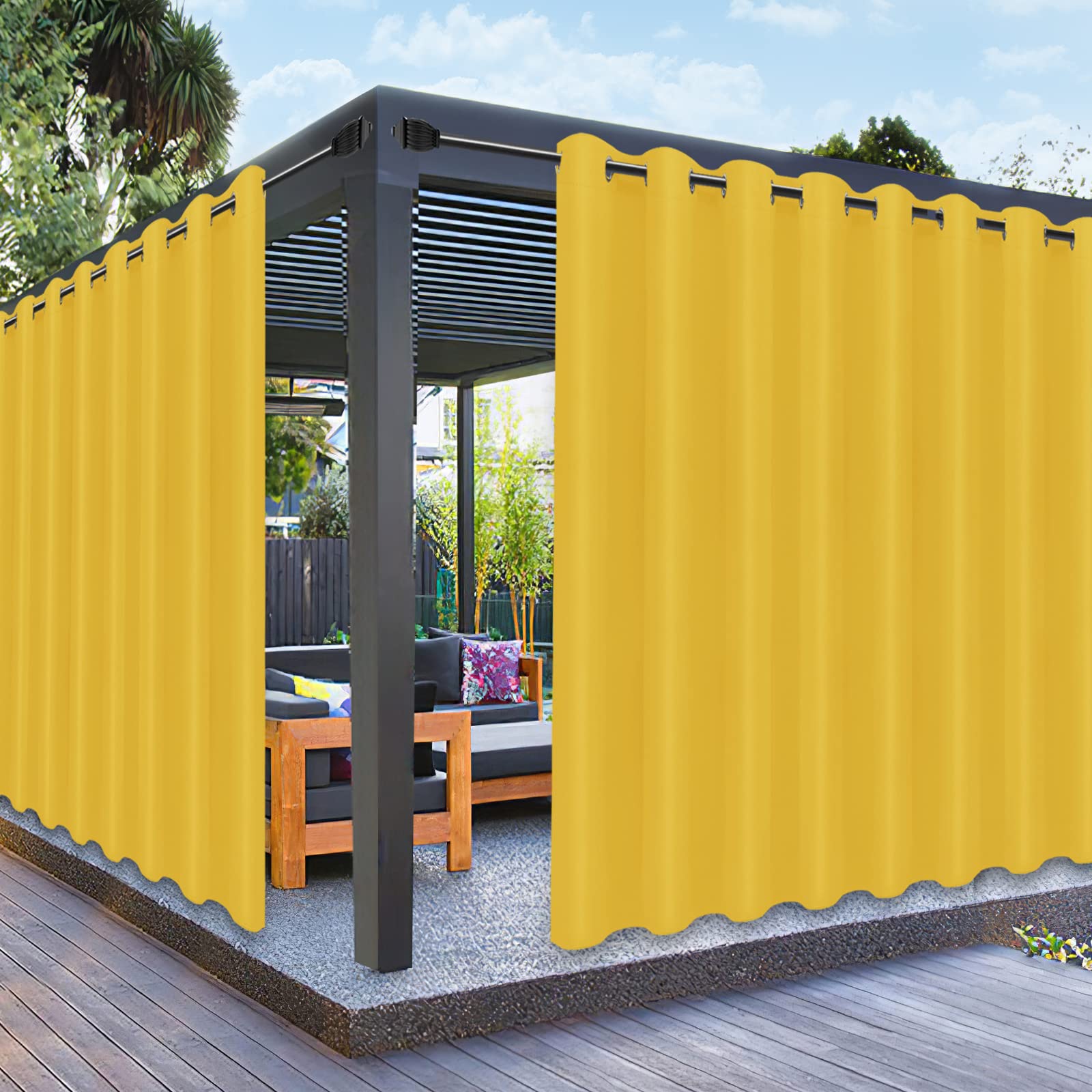Yellow PureFit outdoor curtains provide durable weather protection and privacy for patio spaces.