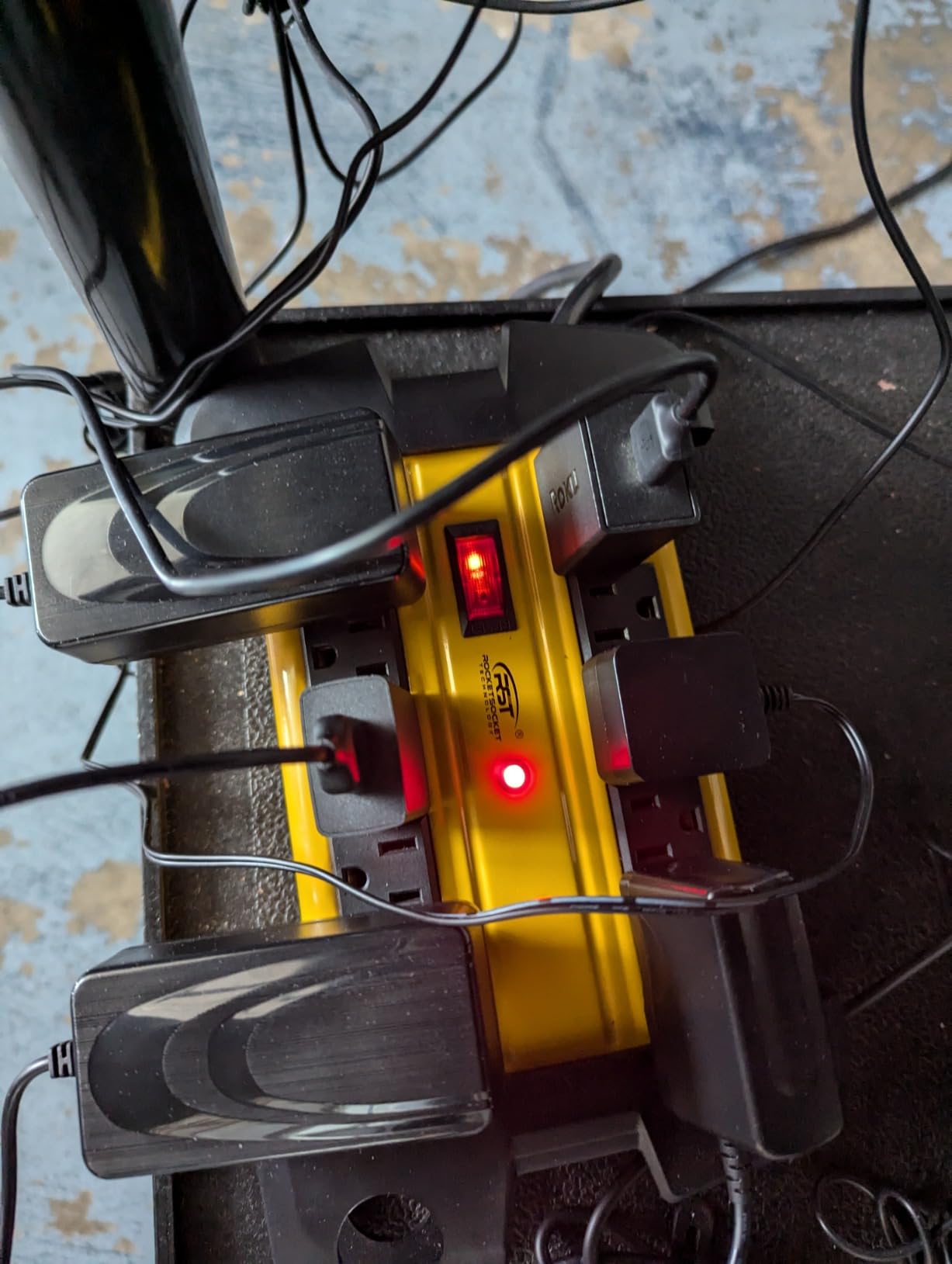 CRST power strip cord management in use