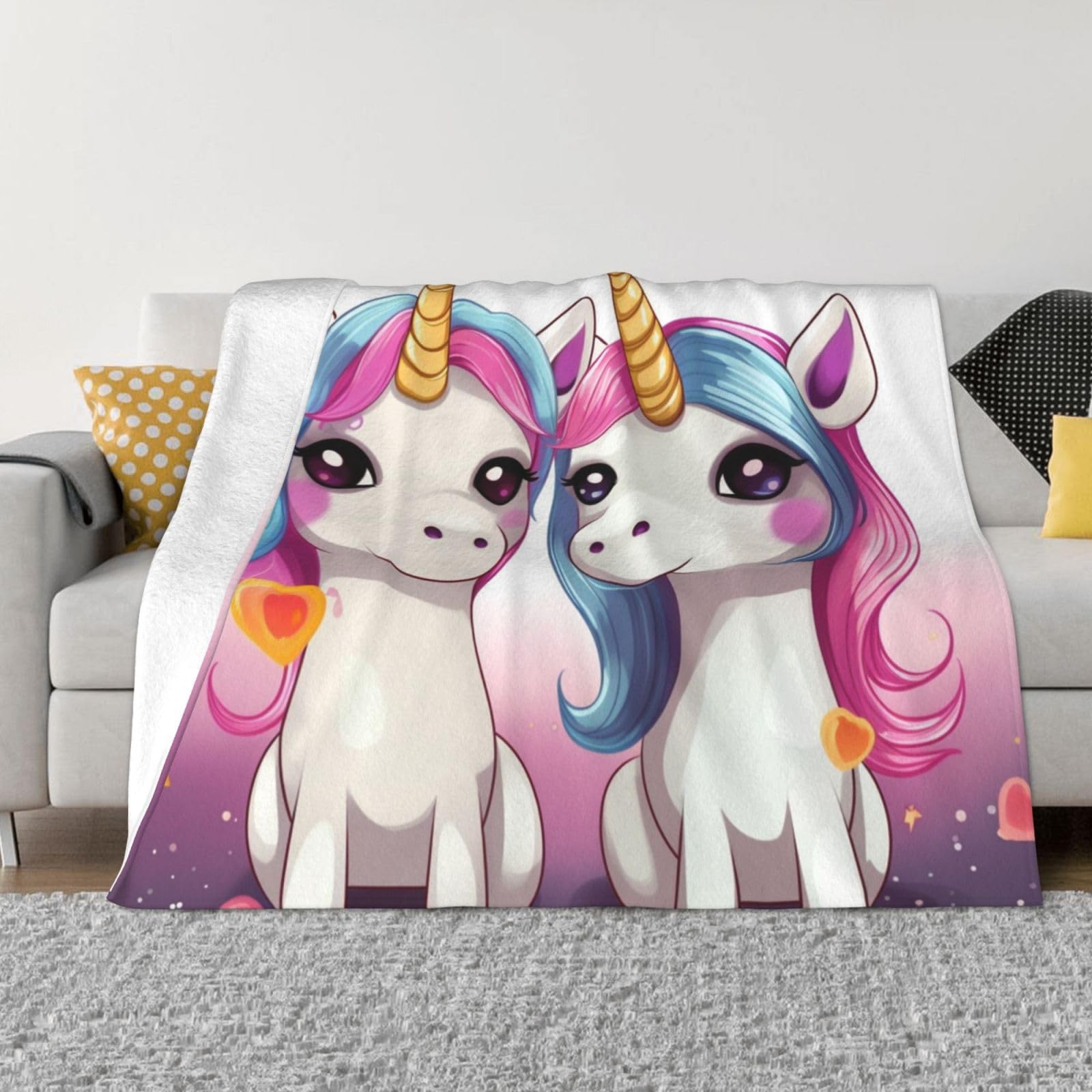 Couverture micro polaire licorne pour des soirées cocooning chaleureuses sur le canapé du salon