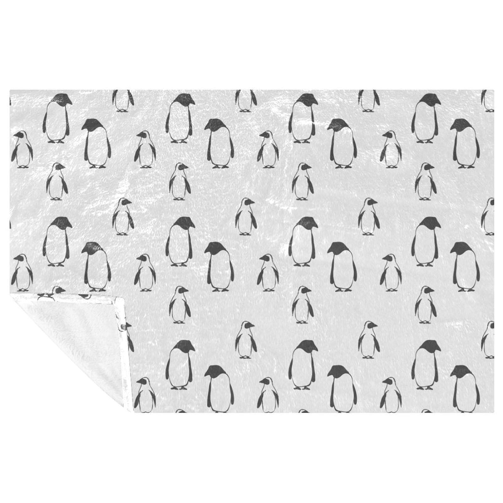 Couverture douce pingouin, le cadeau idéal pour réchauffer le lit