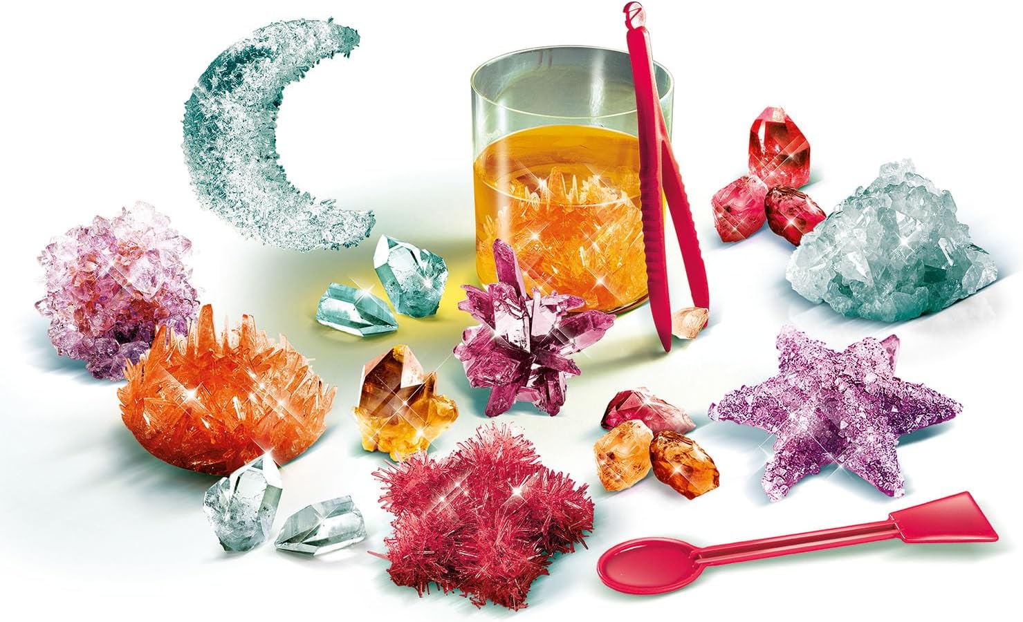 A close-up of various colorful crystals, some clear, some opaque, showing their unique geometric structures and sparkling surfaces.