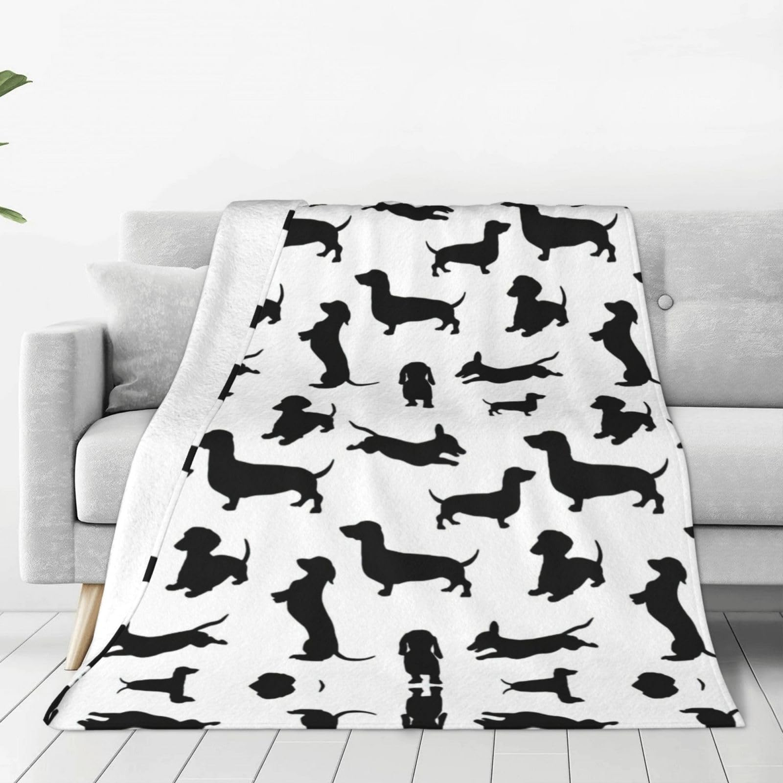 Couverture teckel noir en polaire légère pour lit et canapé