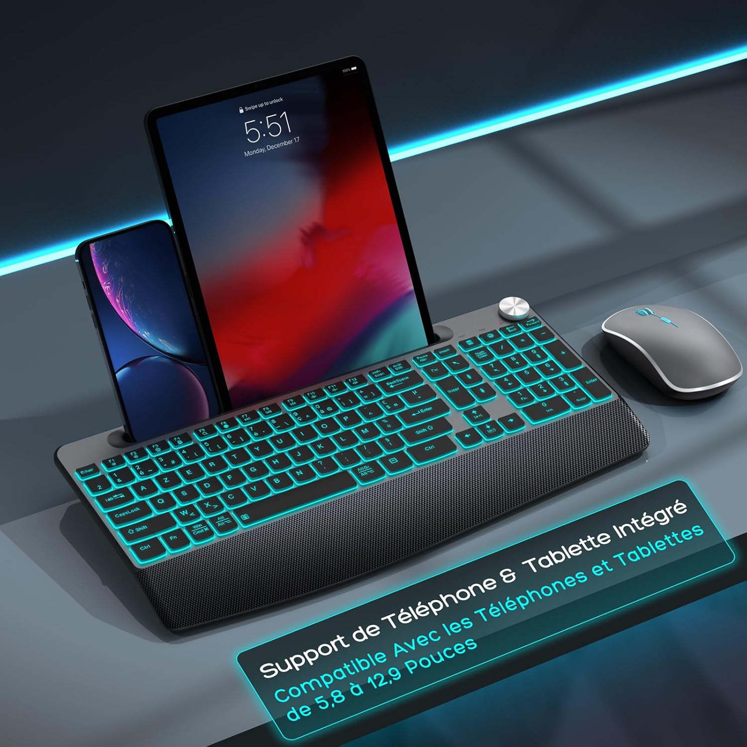 Keyboard with an integrated stand holding a smartphone and a tablet, alongside the wireless mouse.