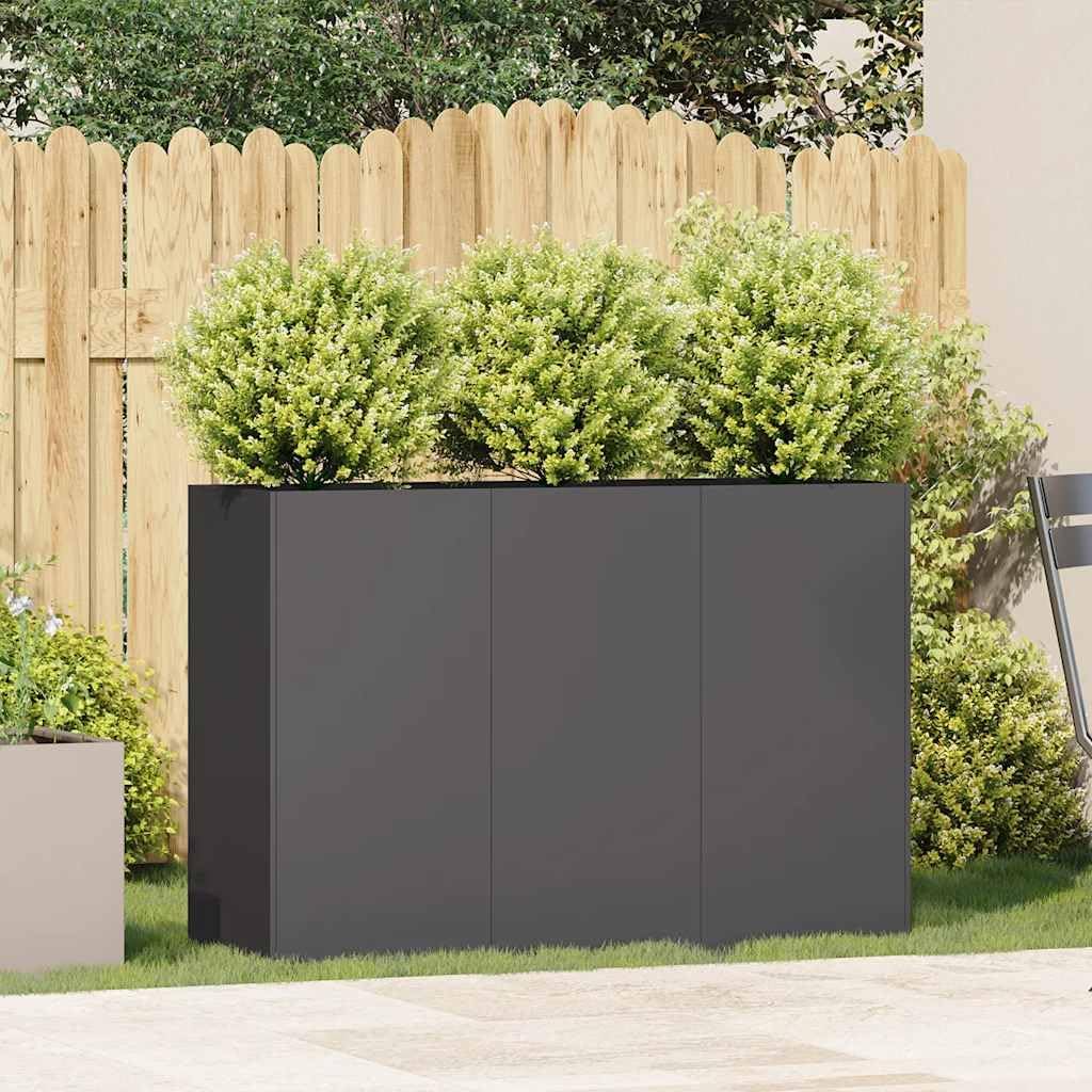 vidaXL Cold-Rolled Steel Planter placed in a garden setting with plants