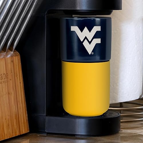 Miniatura 258 de Rico Industries NCAA Miami of Ohio Redhawks - Vaso de cerámica de 16 onzas con agarre de silicona, grabado láser profundo, diseño de color negro