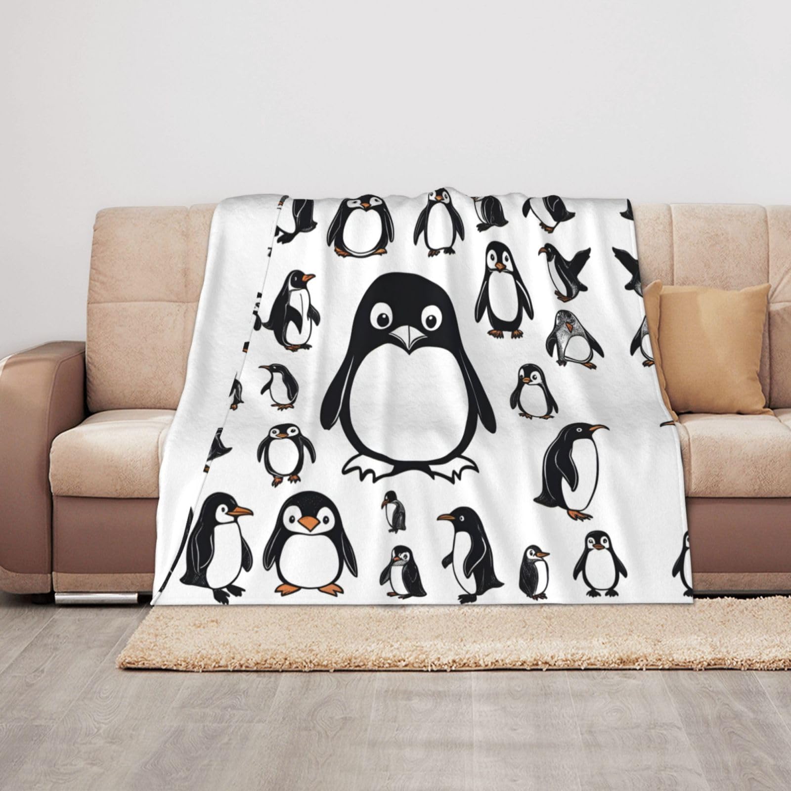 Couverture pingouin douillette pour offrir tendresse et chaleur à vos proches