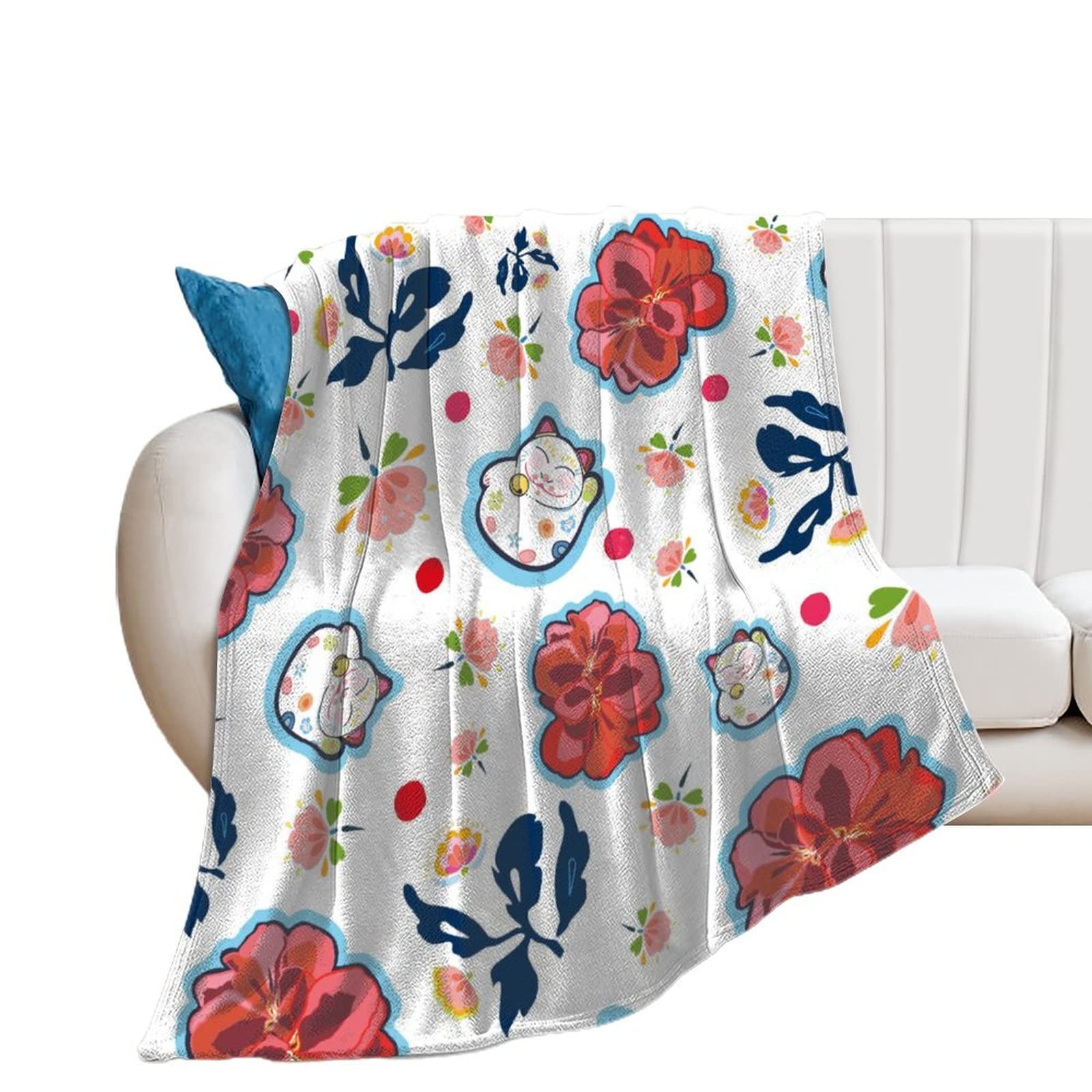 Couverture polaire chat de fleurs pour des moments cocooning sur votre canapé