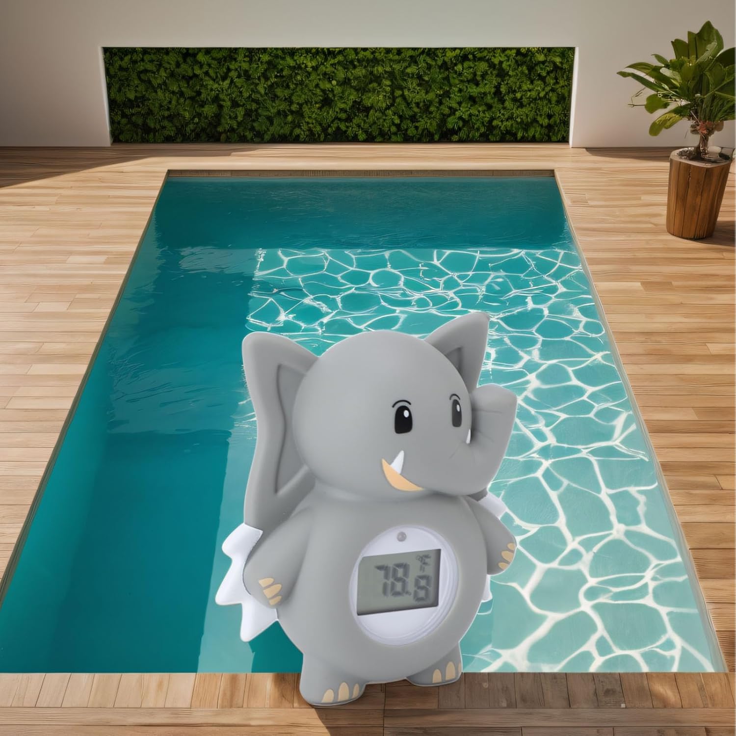 Jectse Baby Bath Thermometer floating in a clear blue swimming pool, displaying a temperature reading.