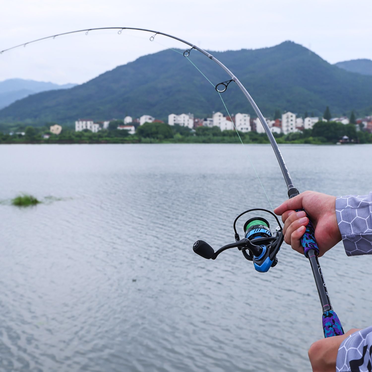 Sougayilang MX-1 - Canna da spinning e mulinello, canna da spinning a 2 sezioni con mulinello da spinning 11+1BB, set per pesca di spigola, spigola, merluzzo, merluzzo, wrasse