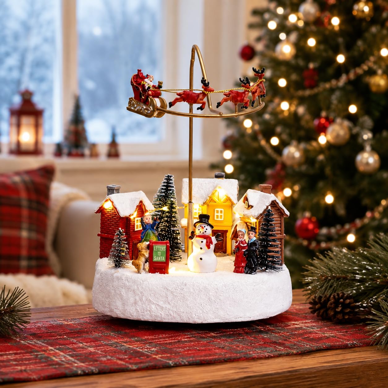 Candieslife Decoración animada de pueblo de Navidad, figura de mesa con diseño de Papá Noel volador y reno en el aire, figura de mesa iluminada de invierno con casas y muñeco de nieve, centro de mesa
