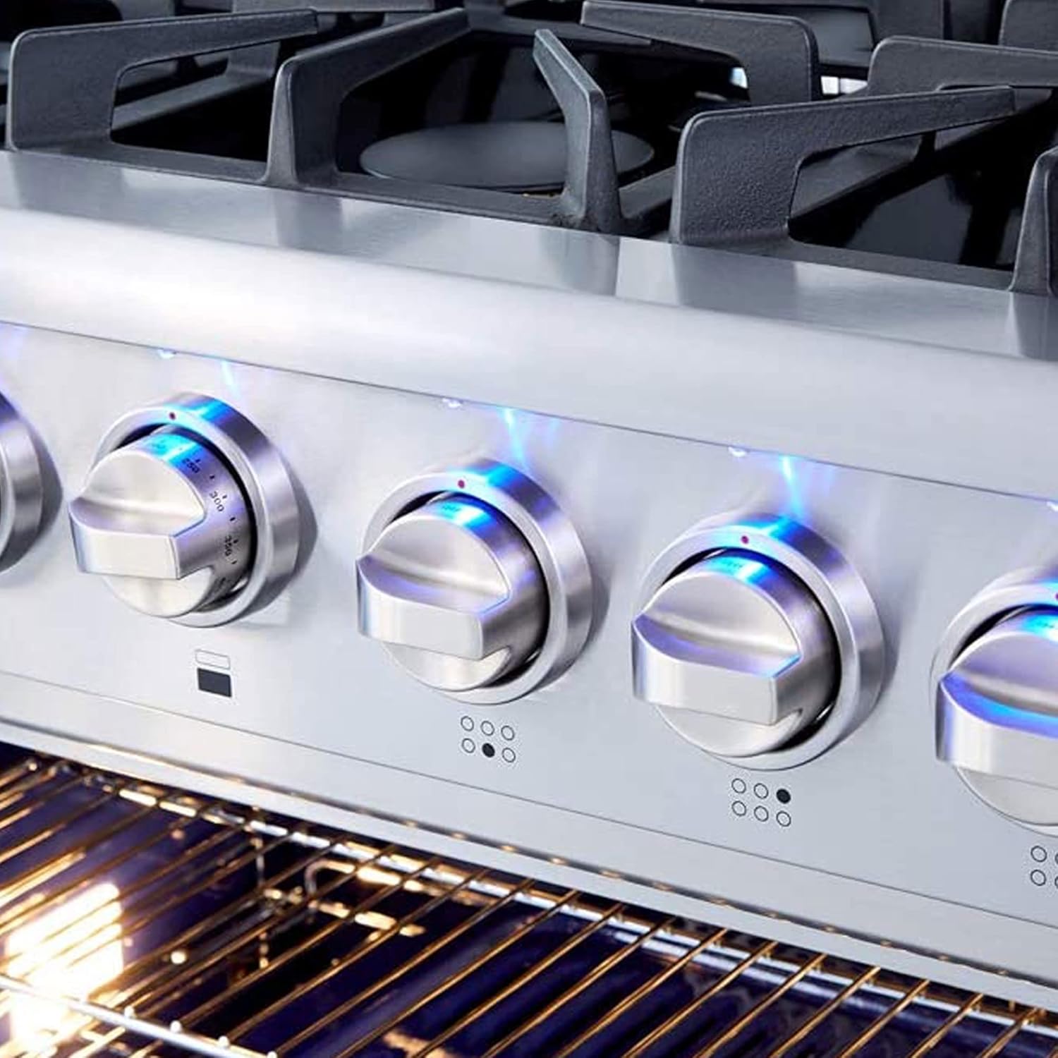 Close-up of the control knobs on the THOR Kitchen HRG3616U gas range with blue LED illumination