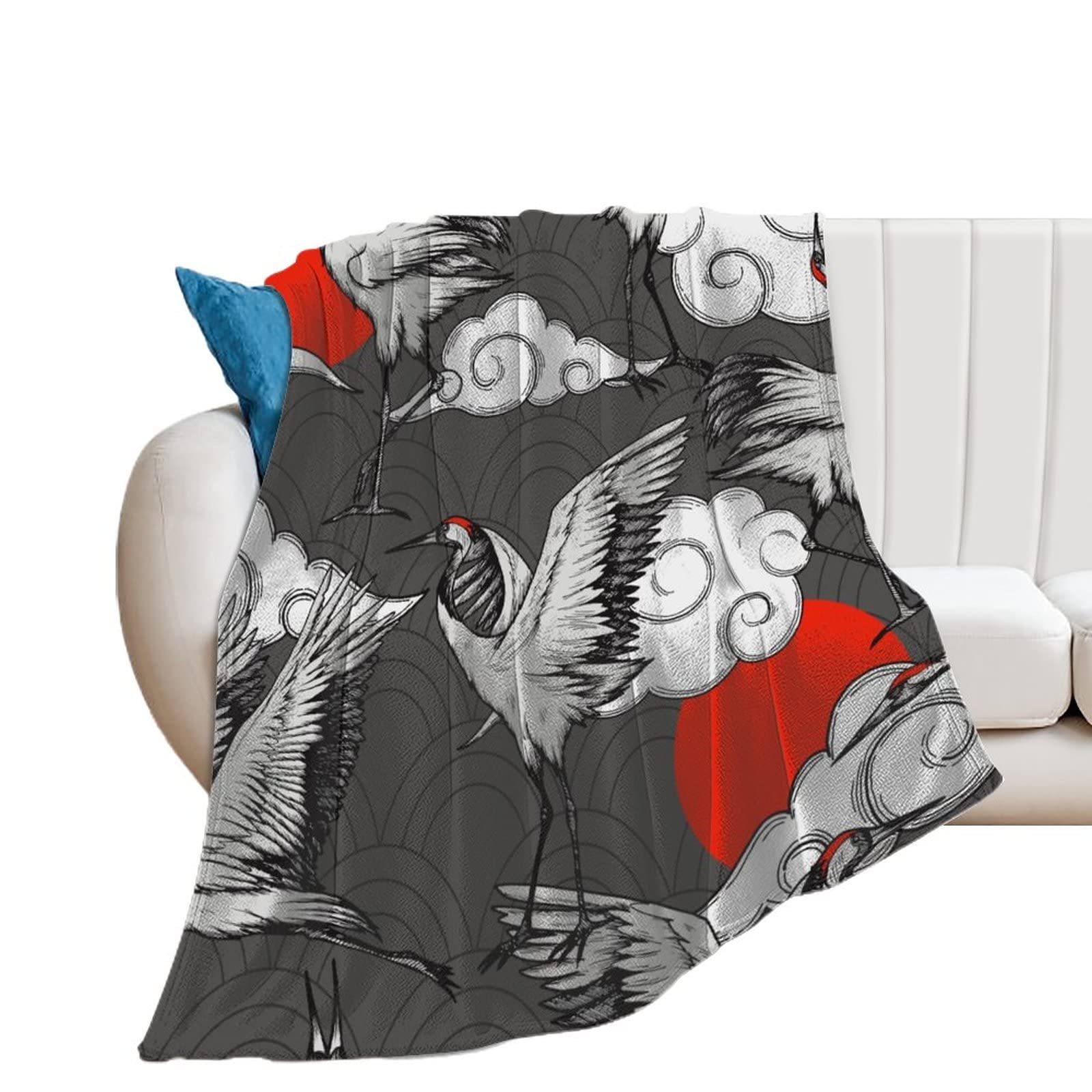 Jeté de canapé grue rouge en polaire pour vos soirées cocooning 100x130