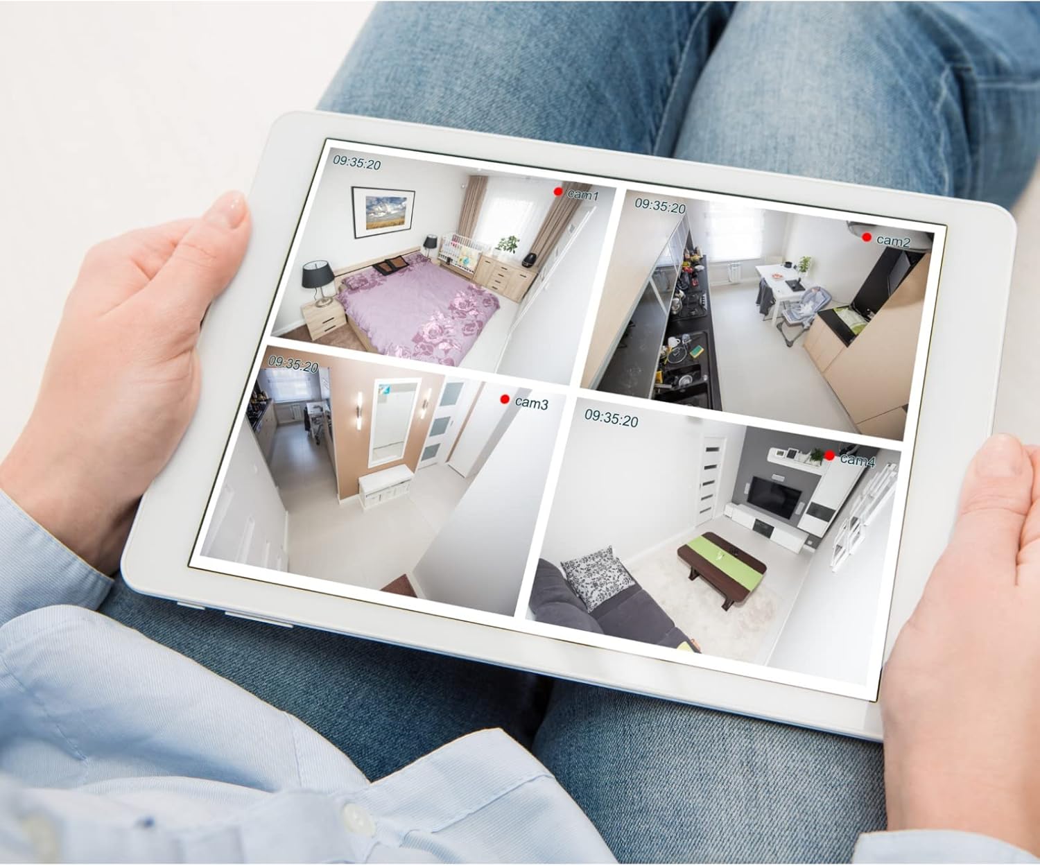 Tablet displaying multiple surveillance camera feeds