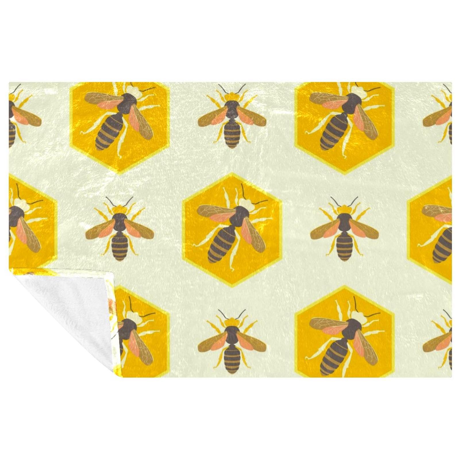 Couverture douce motif abeilles : un cocon de tendresse pour lit et canapé