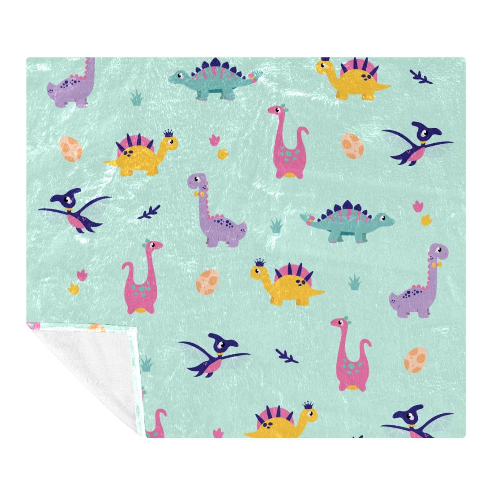 Couverture polaire dinosaure douce pour des moments complices au salon