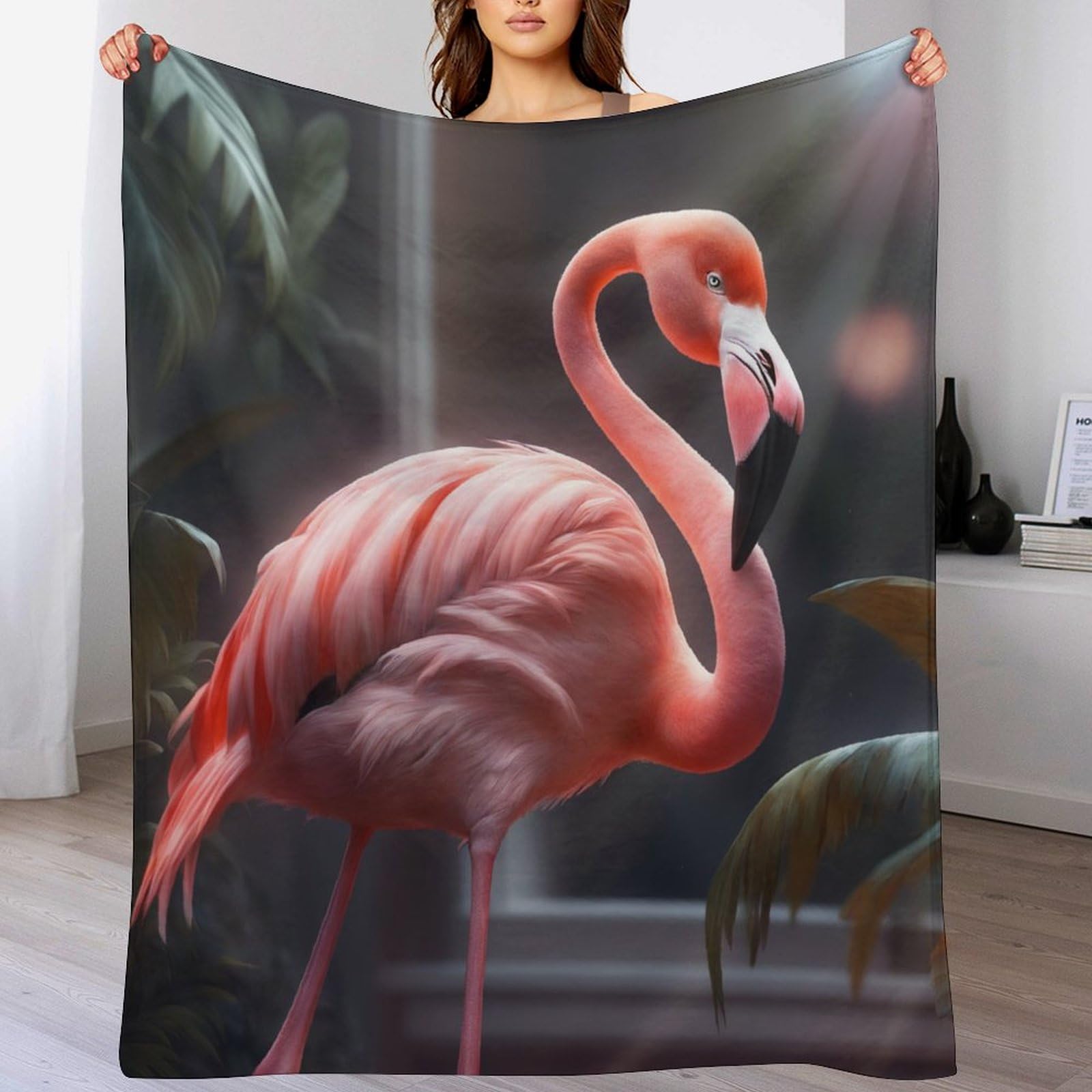 Couverture douce et moelleuse flamant rose contre le froid hivernal sur le canapé