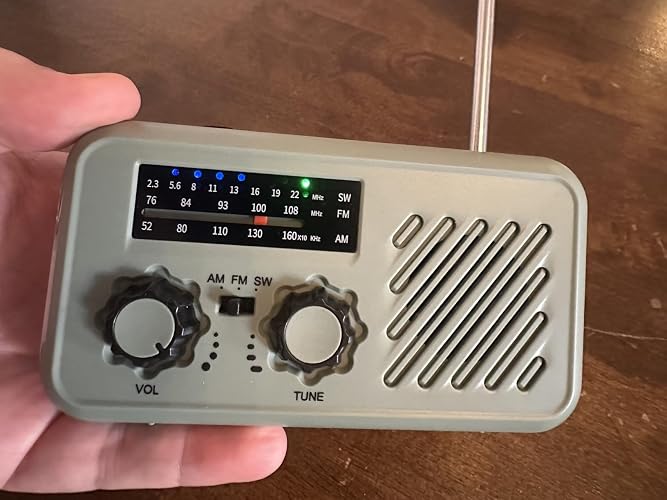 Radio Portátil De Emergencia Con Solar Y Dinamo – FM/AM/SW, Linterna LED, 2000mAh Y Alarma SOS Para Camping