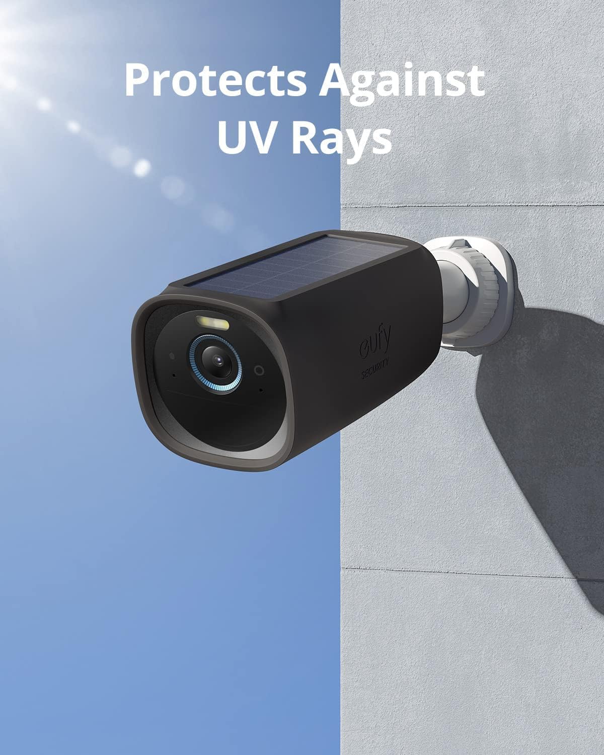 eufyCam 3 camera with black silicone skin mounted on a wall, with a bright blue sky on one side and a shaded area on the other, illustrating UV protection.