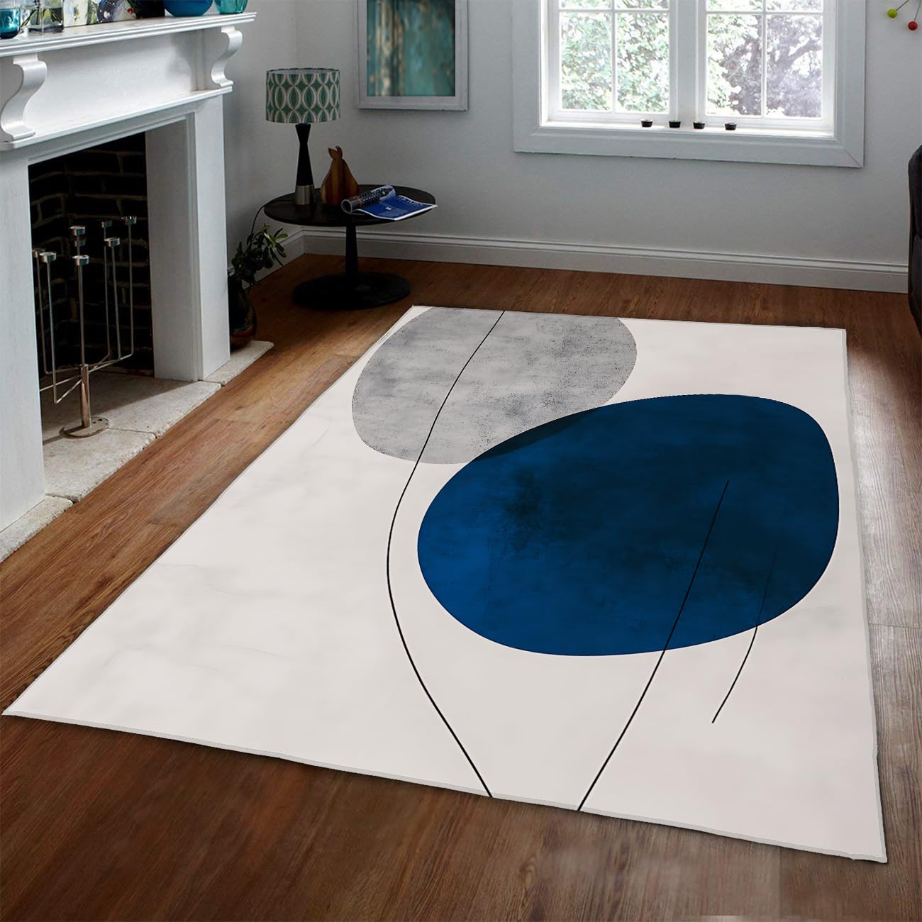 Tapis abstrait bleu et gris 150x210 au design geometrique elegant