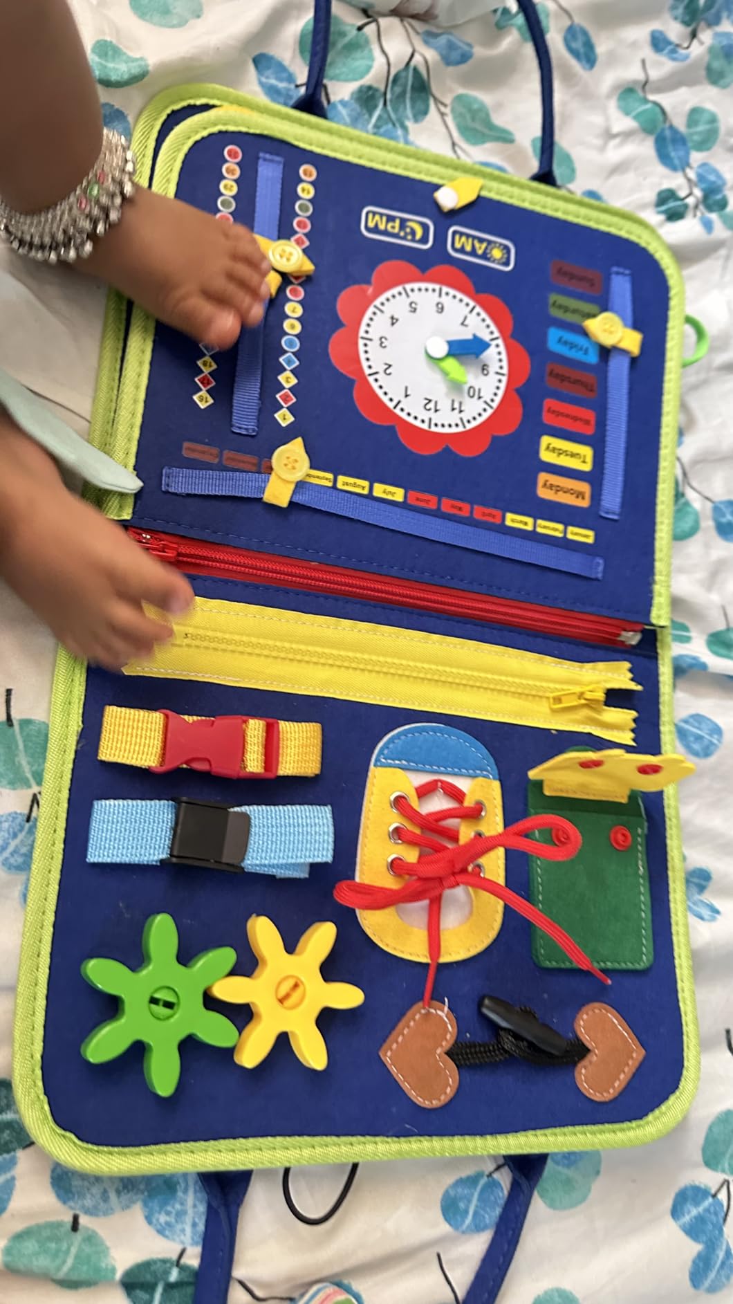 Customer photo of child playing with the busy board