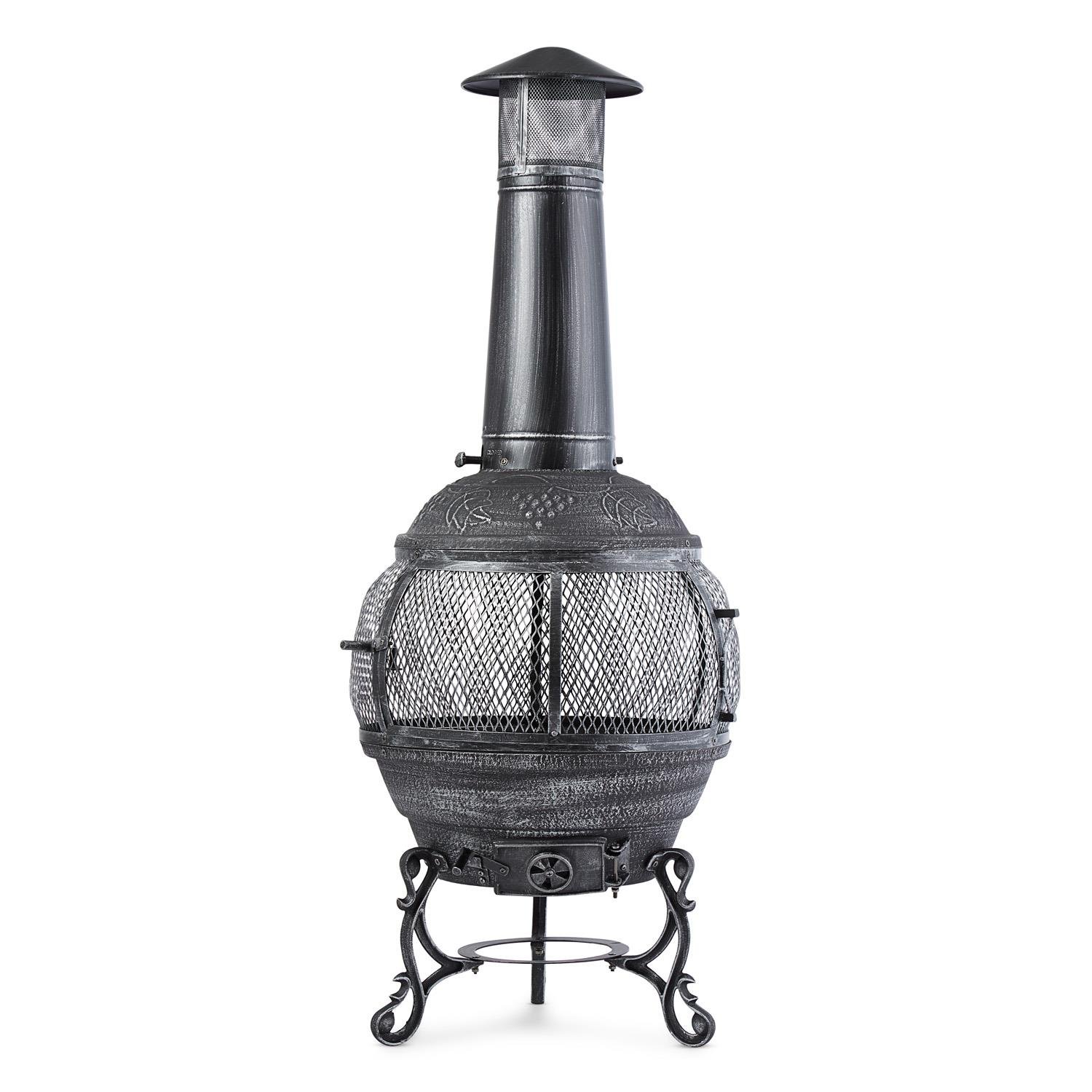 Blumfeldt Flavius - Chimenea Exterior, Hierro Fundido, 140 cm Altura, diseño Antiguo, brasero terraza Apto Carbon o leña, Fuego Circular, Incluye atizador y Parrilla, Plateado