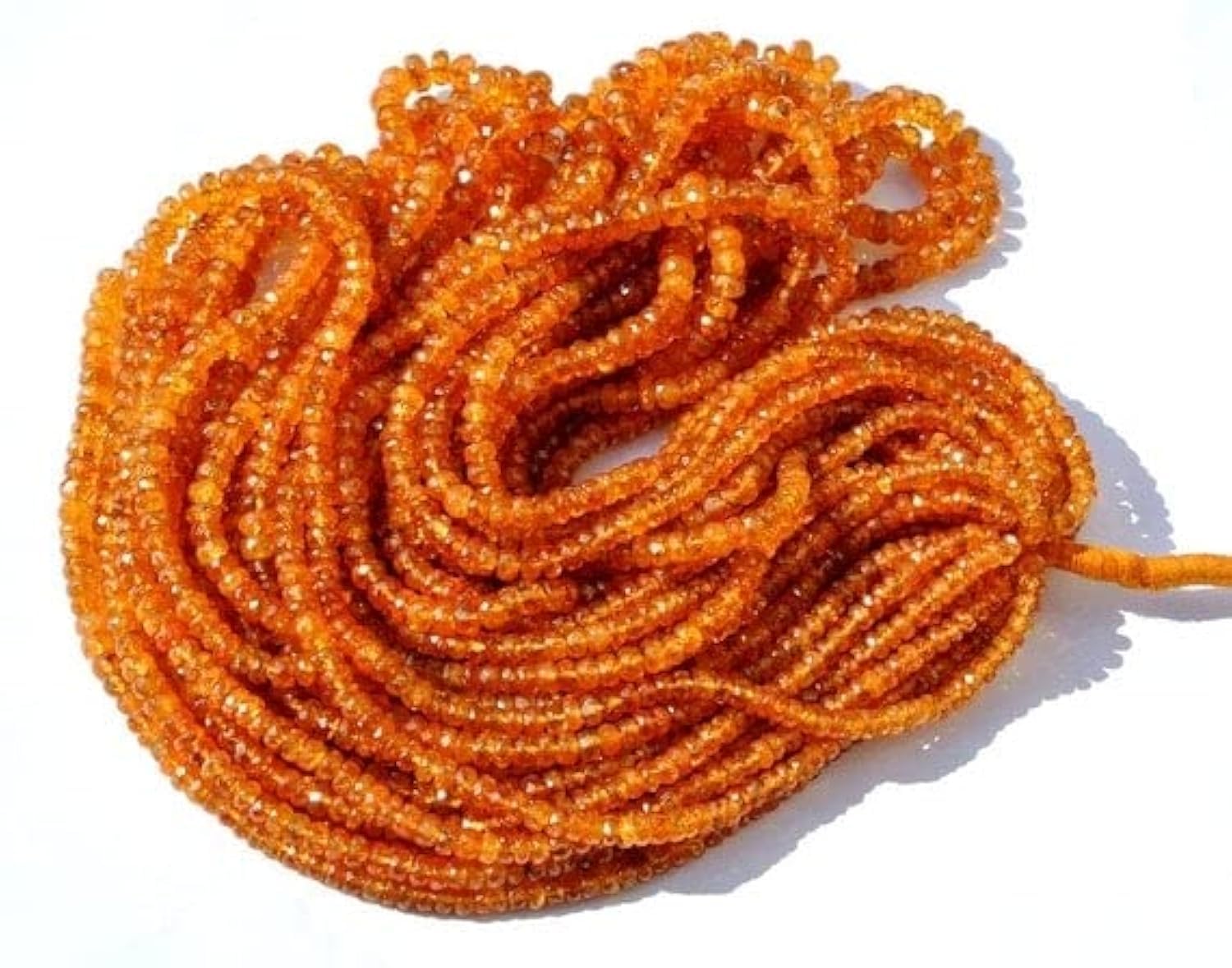 Grenat spessartite orange mandarine rare en perles rondelles facettées de haute joaillerie