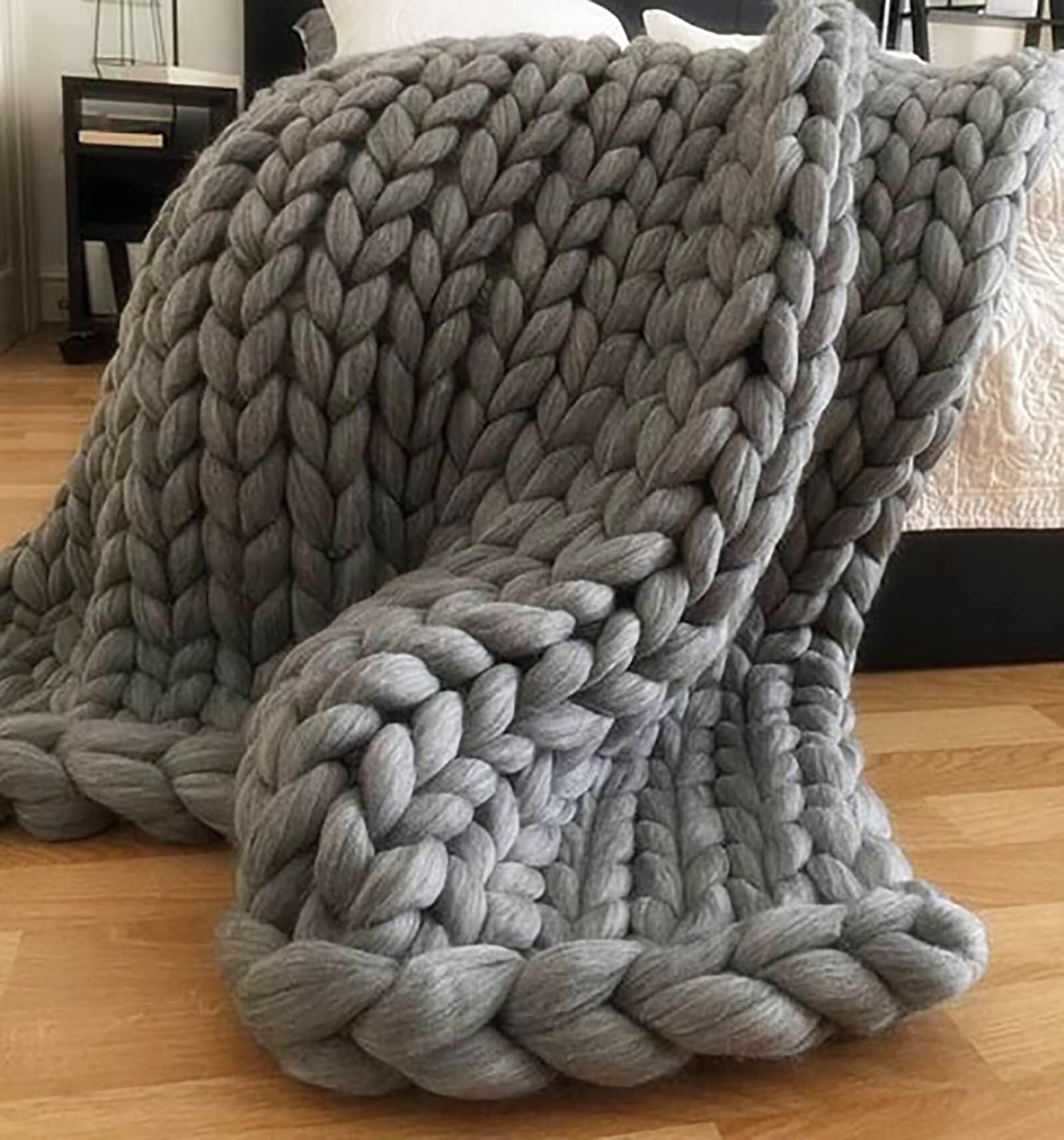 Couverture douce en maille pour une chaleur confortable sur la chaise