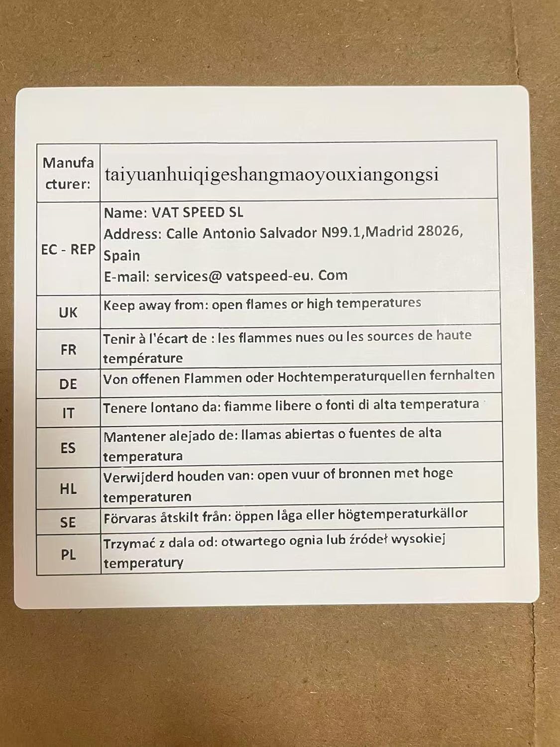 Product label showing manufacturer information: Name VAT SPEED SL, Address Calle Antonio Salvador N99.1, Madrid 28026, Spain, E-mail services@vatspeed-eu.Com. Also includes warnings in multiple languages to keep away from open flames or high temperatures.
