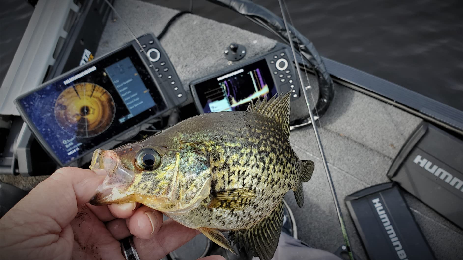 Humminbird Helix fish finder mounted on a boat console