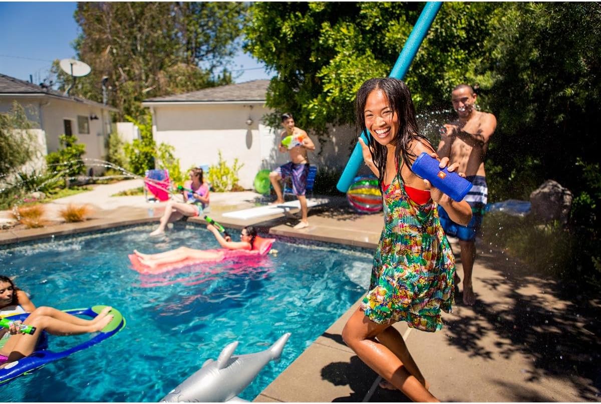People enjoying a pool party with the JBL Flip 3 speaker