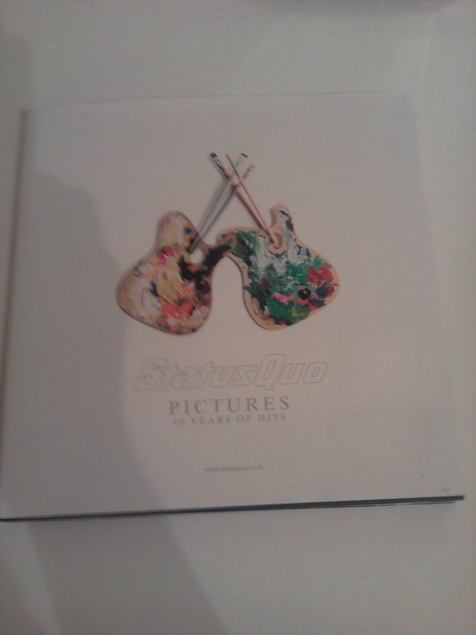 Status Quo Pictures - 40 Years Of Hits EarBOOK + 4CDs