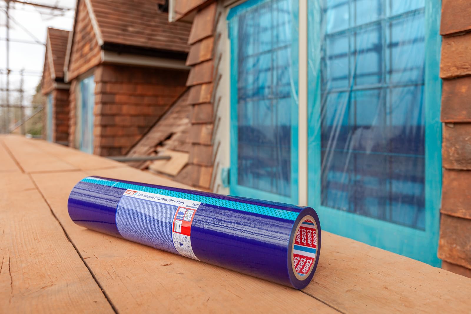 tesa lámina protectora autoadhesiva - protege contra el polvo y los arañazos, ideal para ventanas y espejos, reutilizable - rollo de 100 m x 75 cm, apto para uso en interiores y exteriores