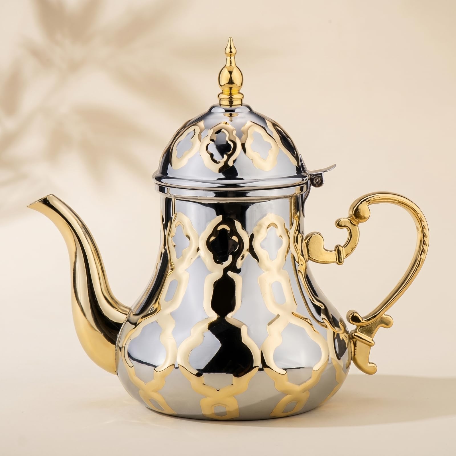 Colcolo Tetera de Acero Inoxidable Jarra Hervidor Cafetera con Cuerpo Compacto y Detalles Calados Vertido Suave y Acabado Pulido Adecuada para Casa Presentación en Estantes de Cocina, 1.2 Litros