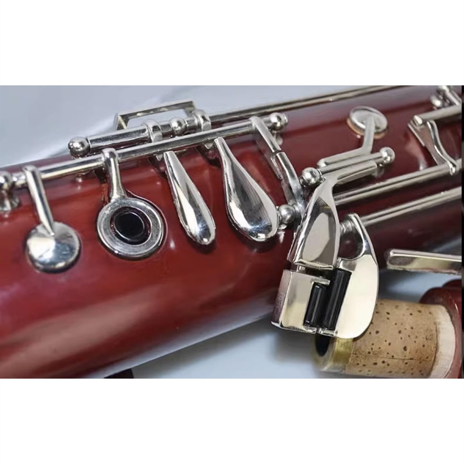 Strumento Per Fagotto Con Tasti Nichelati In Rame Bianco E Prestazioni Professionali Con Custodia Set con Fagotto