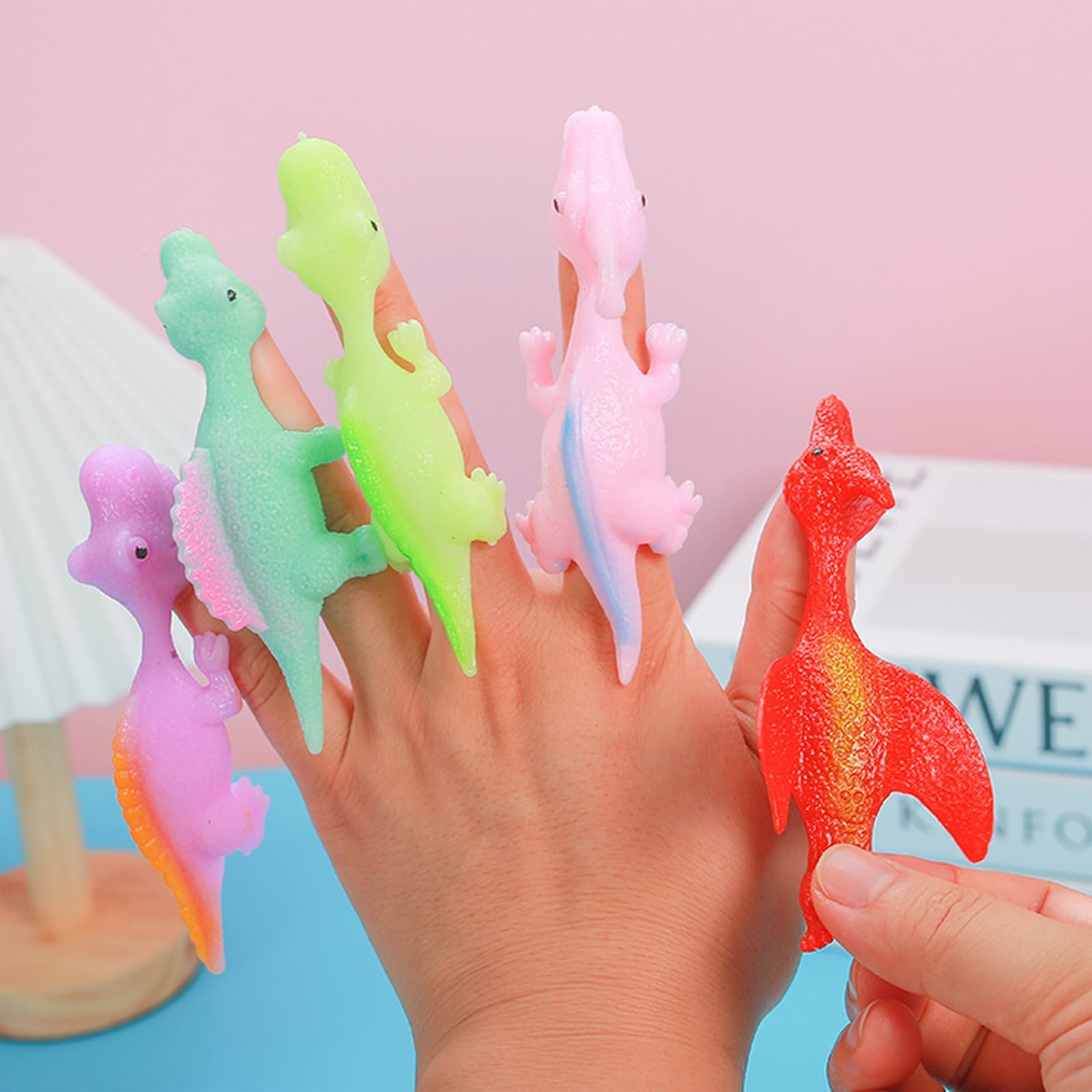 DKDDSSS 20 PCS Juguetes de Dinosaurios, Tirachinas Dinosaurios Juguetes Elásticos, Muy adecuados para Juegos y Fiestas de Vuelo