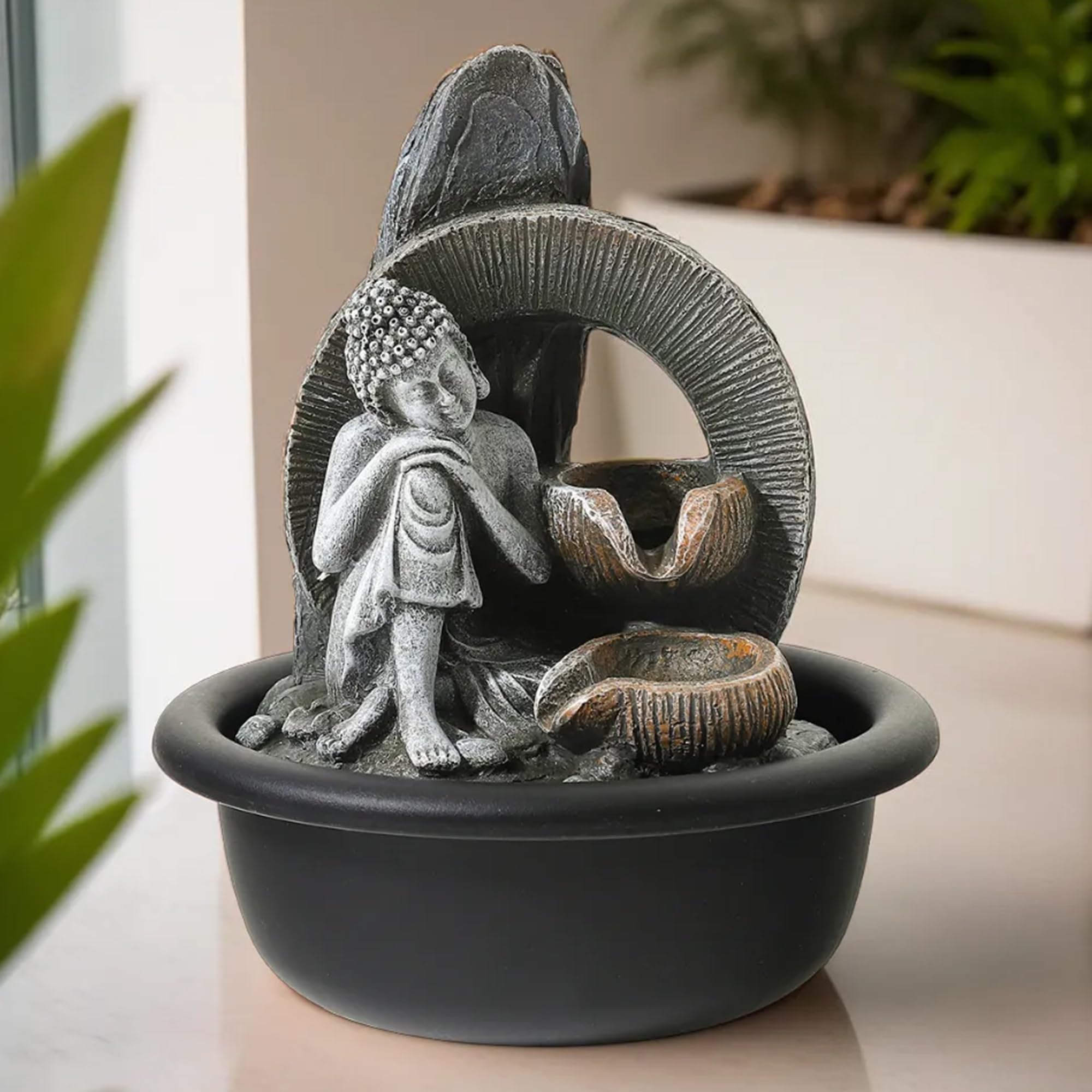 The Better Home Polyresin Buddha Fountain with LED Lights | Small Mini Fountain Water Falls Showpiece, Table Top, Home Decoration Items | Waterfall Fountain for Gifting | Grey Color