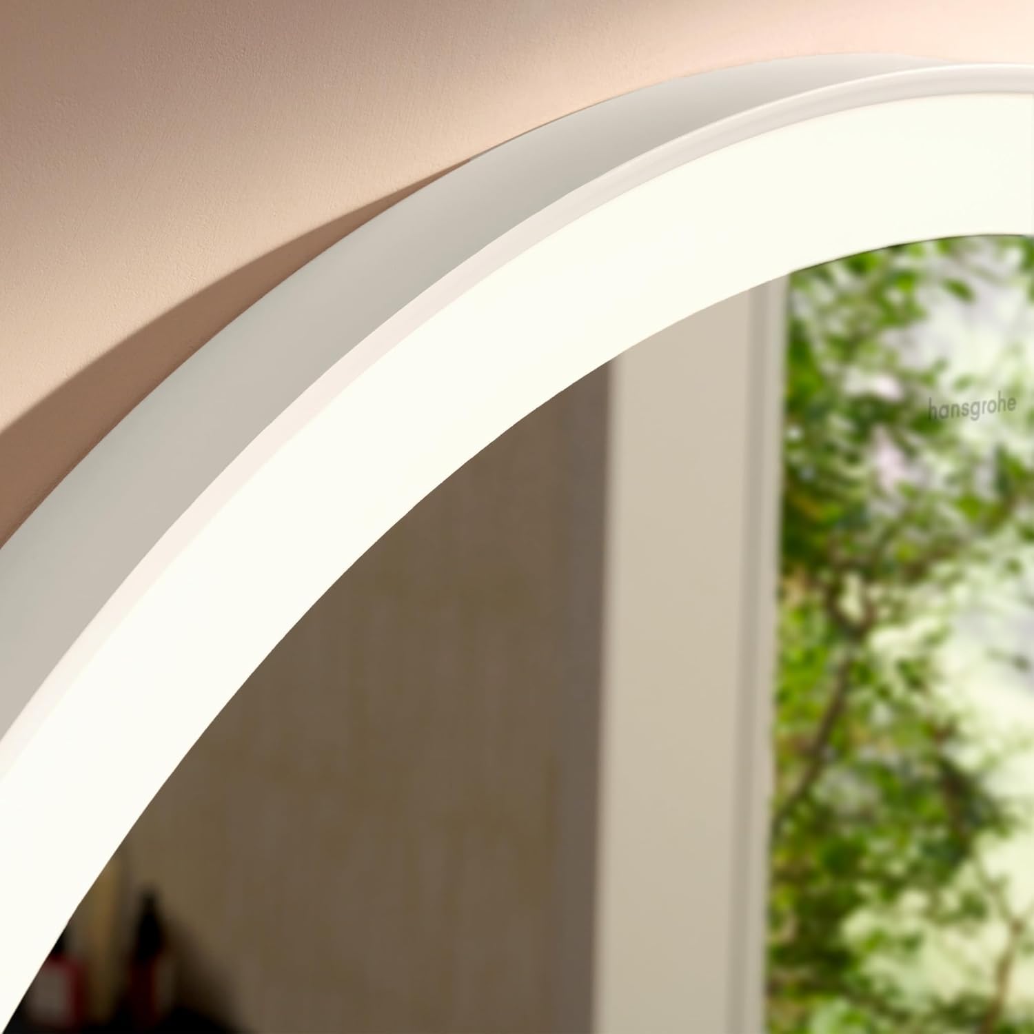 Dimensional drawing of the hansgrohe Xarita Lite S mirror, showing a diameter of 700mm, mounting bracket spacing of 300mm, and a depth of 33mm.