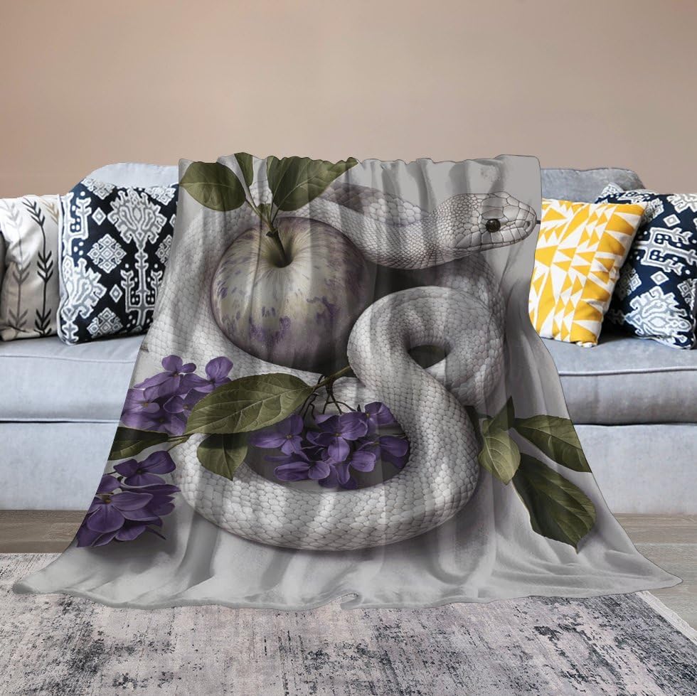 Couverture en micro polaire serpent fleur contre les frissons sur le lit