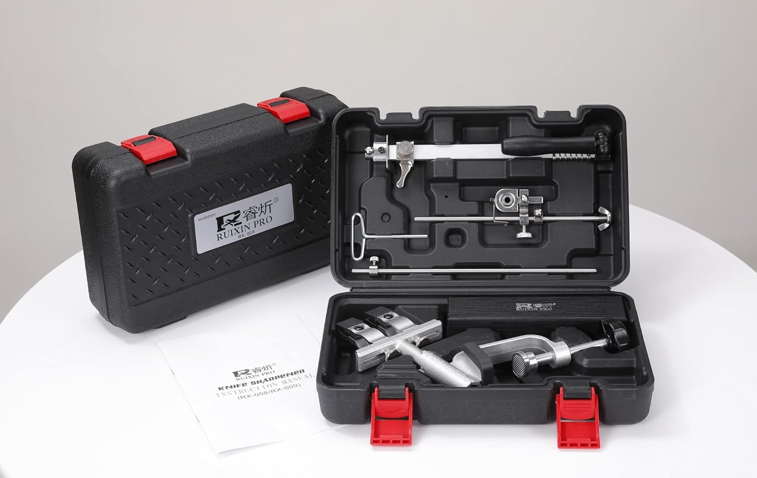 The RUIXIN PRO RX-009 Knife Sharpener components neatly packed inside its black storage case.