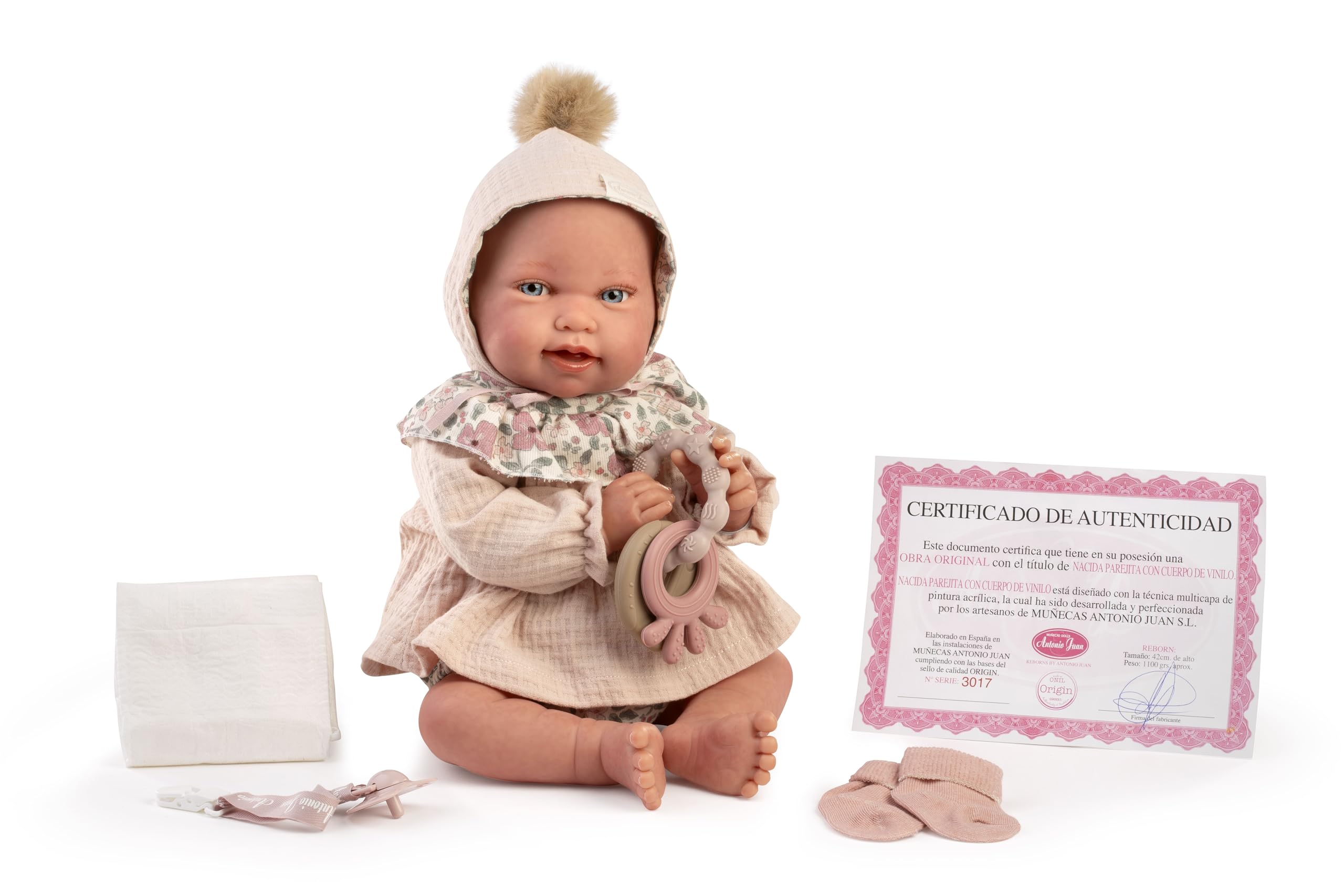 Muñecas Antonio Juan Sweet Reborn Pipa de Paseo, Muñeca Bebé Realista con Cuerpo Blandito, Vestido Floral Beige, Gorro con Pompón, Incluye Accesorios