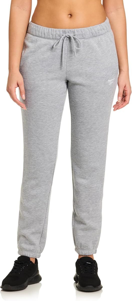 Reebok Pantalón deportivo con parte inferior cincha para mujer, ajuste estándar, tejido de algodón y poliéster de peso medio